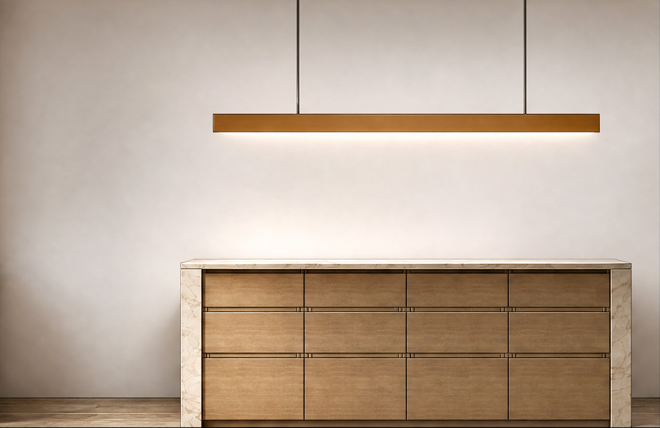 Minimalist wooden sideboard with marble trim underneath a modern hanging wooden light fixture in a neutral-colored room.