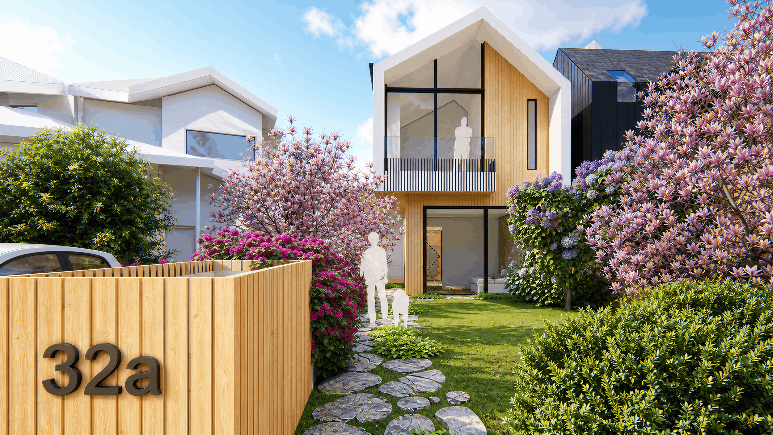 Modern residential houses with large windows, wooden and black exterior siding, and landscaped front yard with flowering trees, shrubs, and a stone pathway.