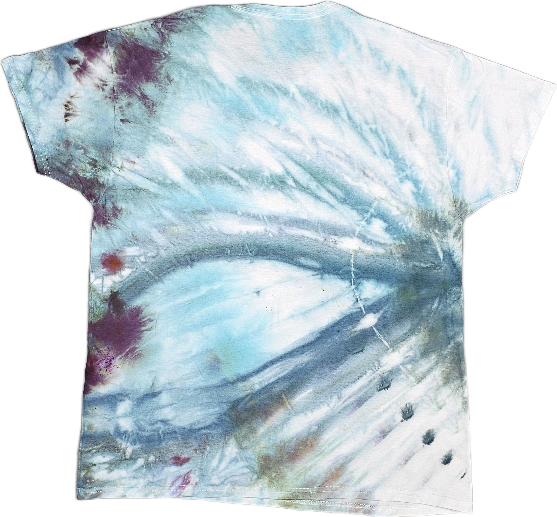 Close-up of a tie-dye T-shirt with blue, purple, and white colors and some paint splatters.