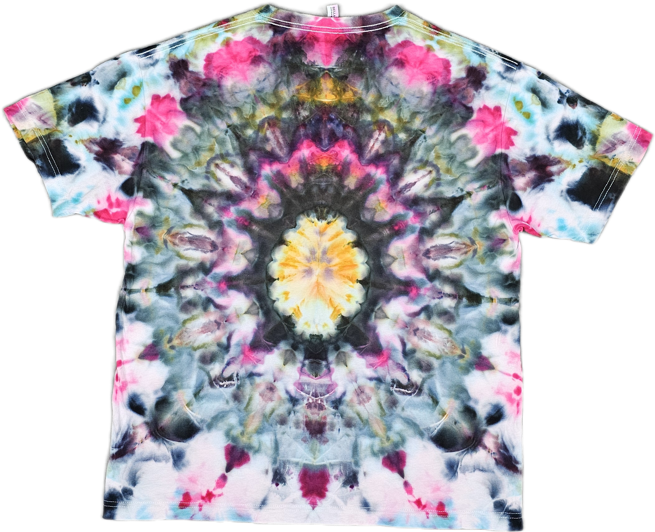 The image features a  Bella + Canvas  colorful tie-dye t-shirt with a symmetrical pattern in shades of pink, yellow, black, blue, and white.