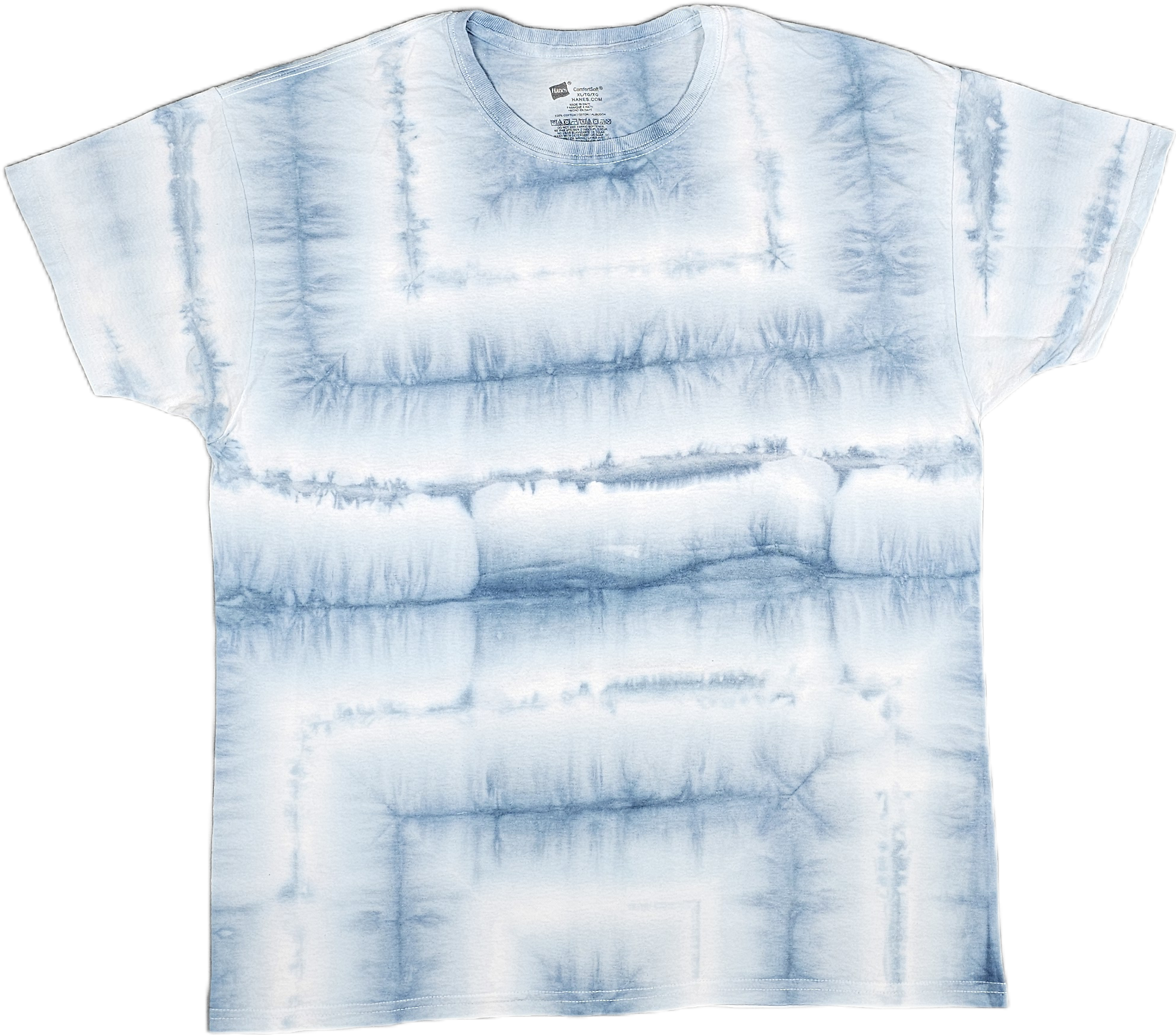 Light blue tie-dye T-shirt laid flat with short sleeves visible, featuring a pattern of darker blue streaks and blotches.