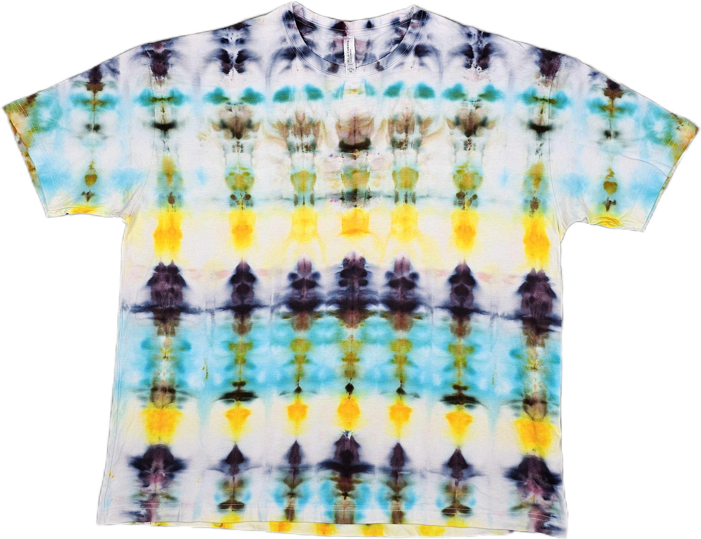 A Bella + Canvas  tie-dye T-shirt with a rainbow pattern of yellow, orange, teal, purple, black, and white colors, laid flat.