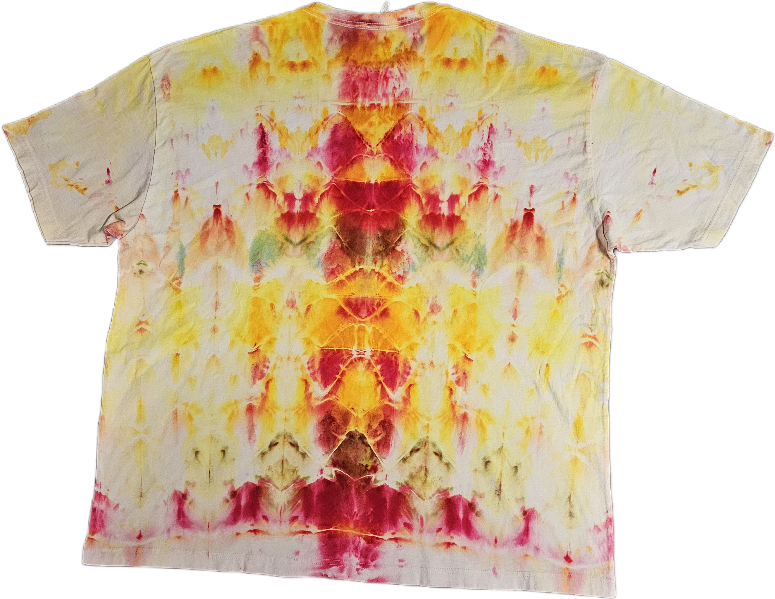A Bella + Canvas  tie-dye T-shirt featuring a symmetrical pattern in shades of yellow, orange, pink, and red.