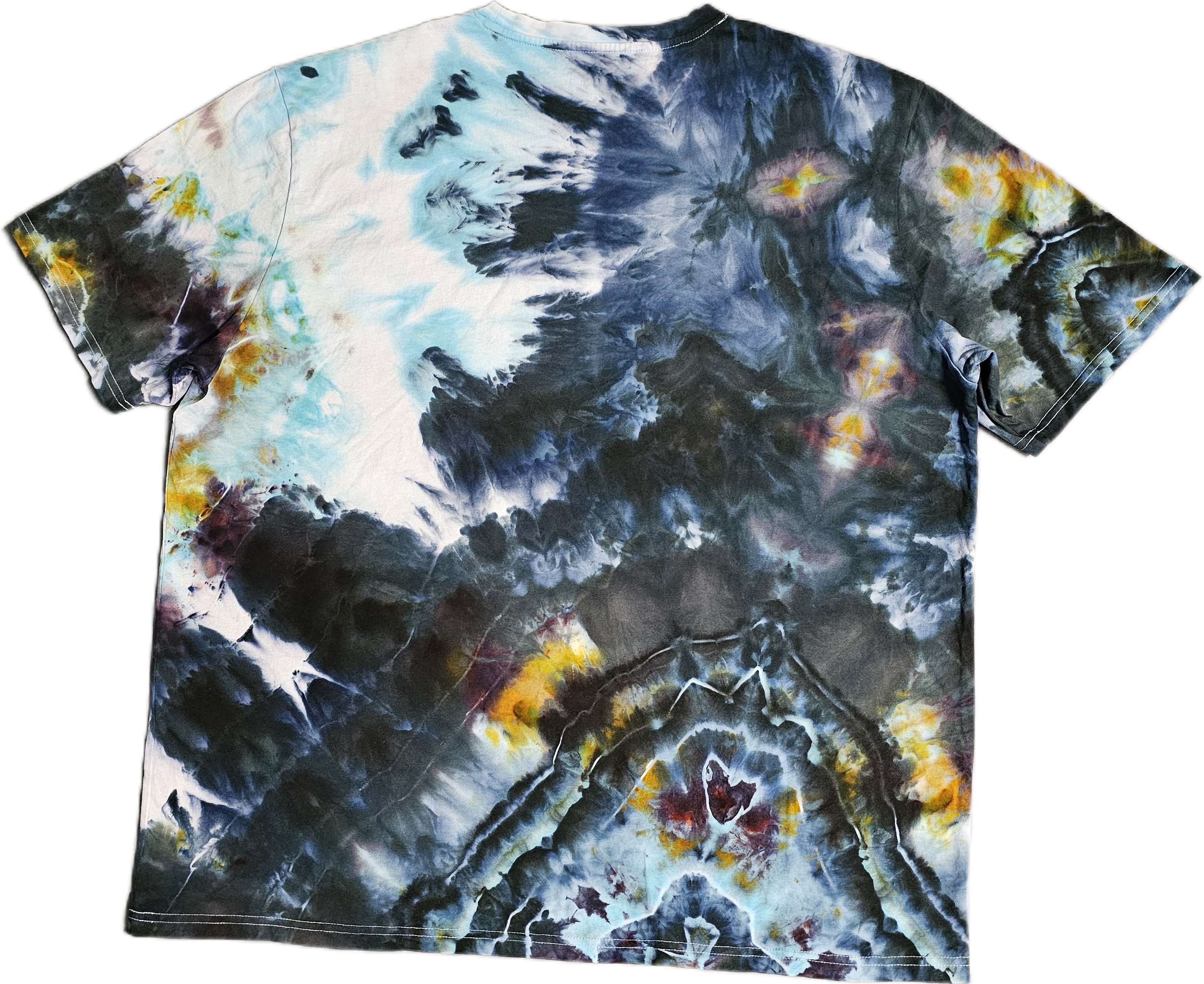 A tie-dye shirt with a mix of black, white, blue, yellow, and red colors in a pattern with swirls and bursts.