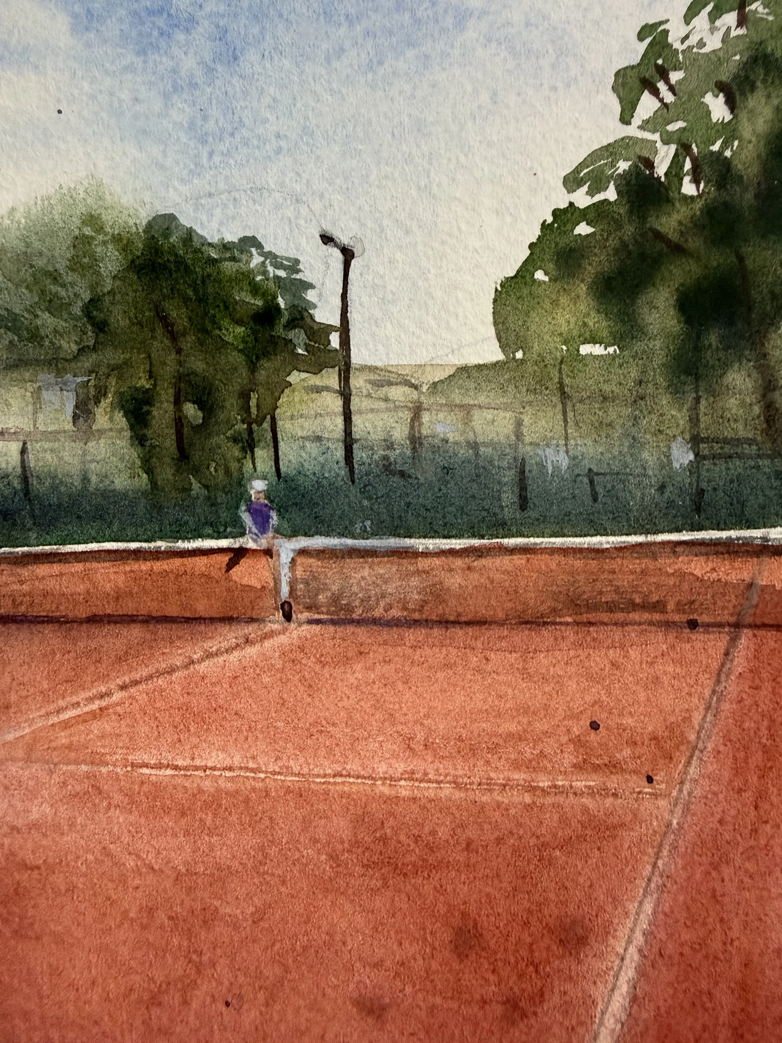 Close-up detail of the clay court and net in Before the Serve