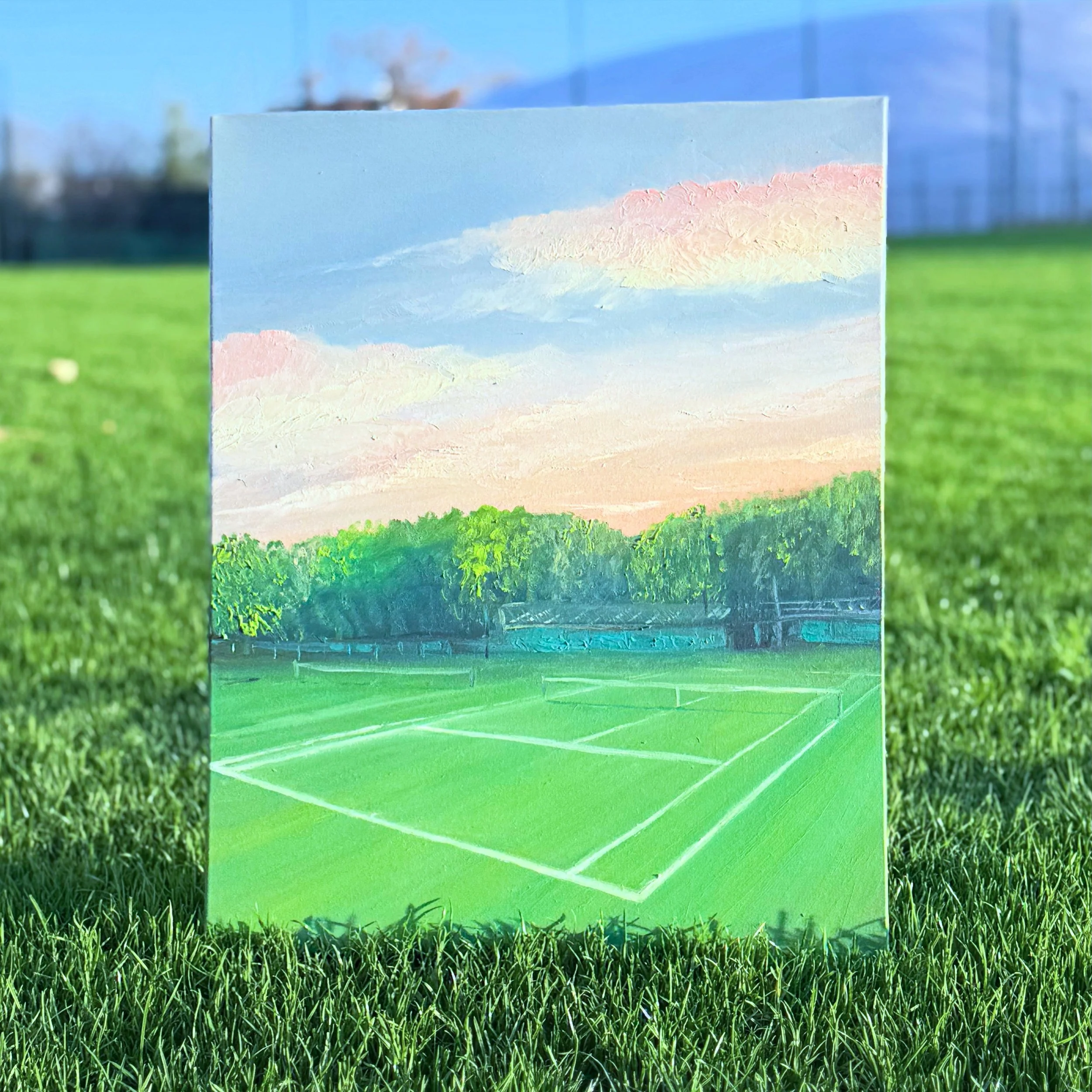 Court 4 painting photographed on the grass at Harpenden Lawn Tennis Club