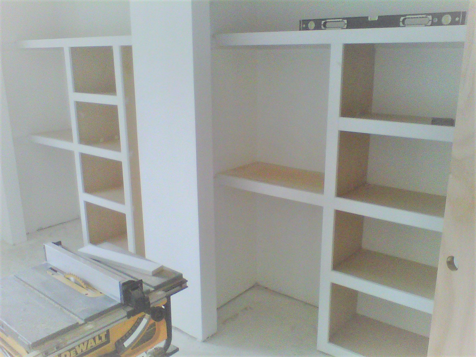 Before: construction of custom closet system built-in shelves 