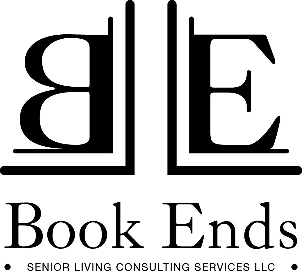 Black and white logo for Book Ends Senior Living Consulting Services LLC, featuring stylized open books with the initials 'BE' in the center.
