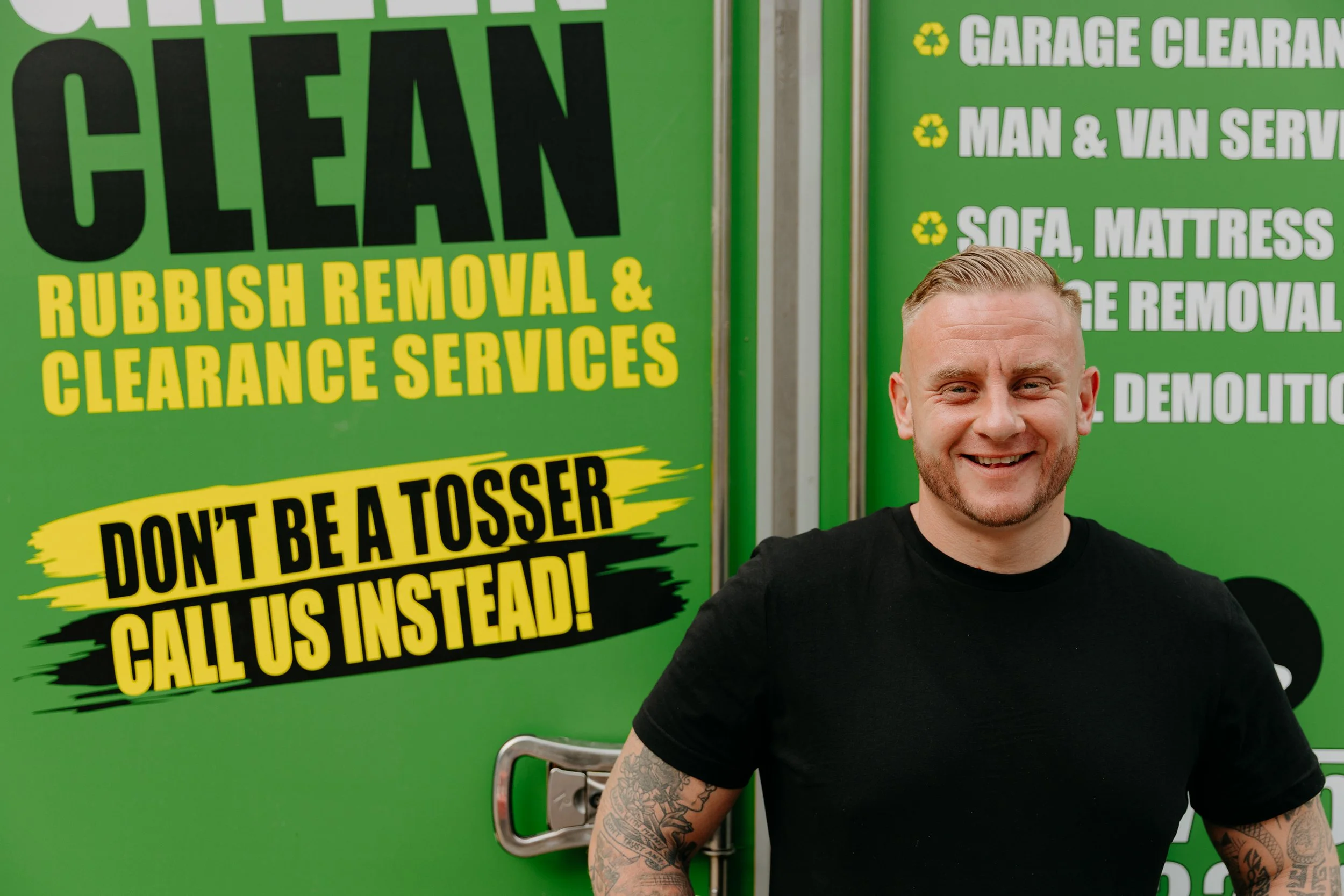 Michael stood proudly in front of the Green Clean Removals van