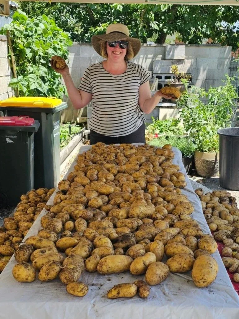Mary enjoying the produce from her spray free, sustainable homegrown garden.