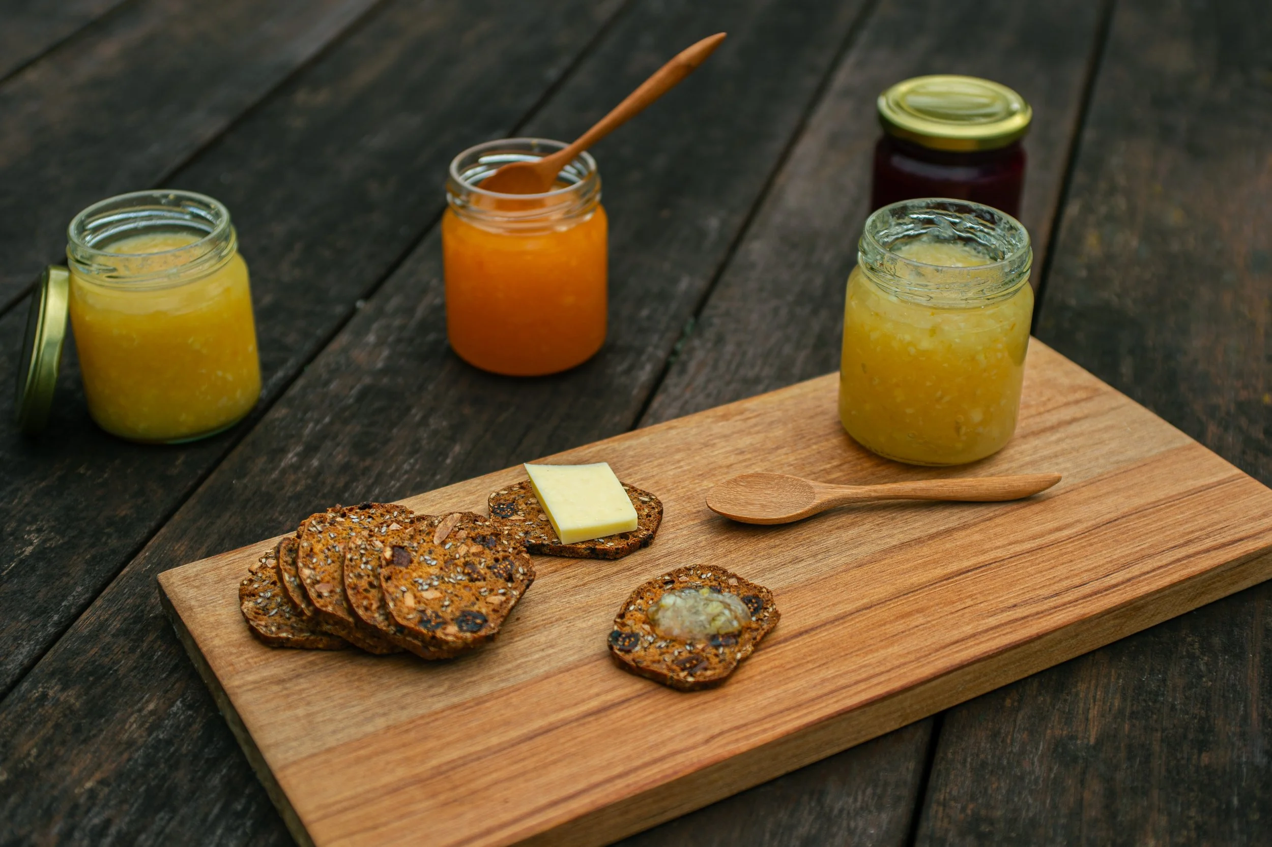 On the Map Marmalades displayed with crackers on a cheeseboard.