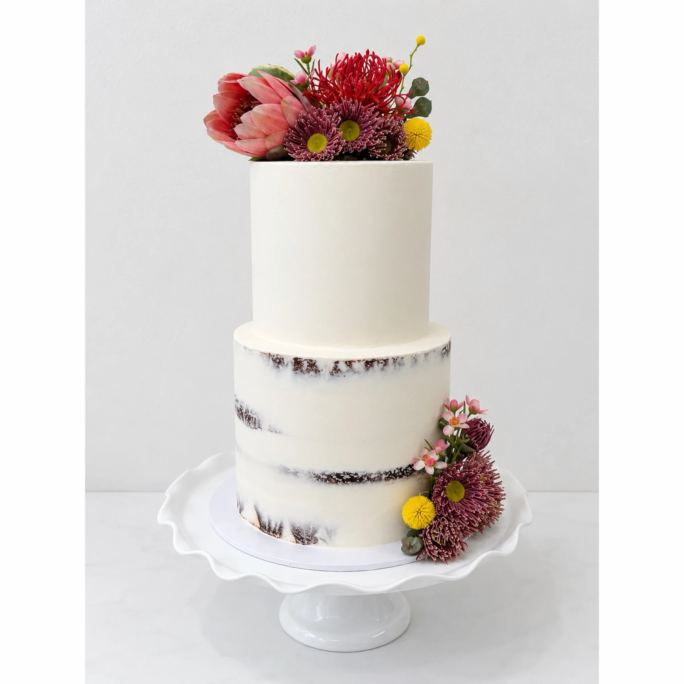 HAYLEY + BLAKE
Semi-naked elegance, finished with beautiful native florals&hellip; 

#biancascakery #nativeflowers #seminakedcake #wedding #weddingcakes