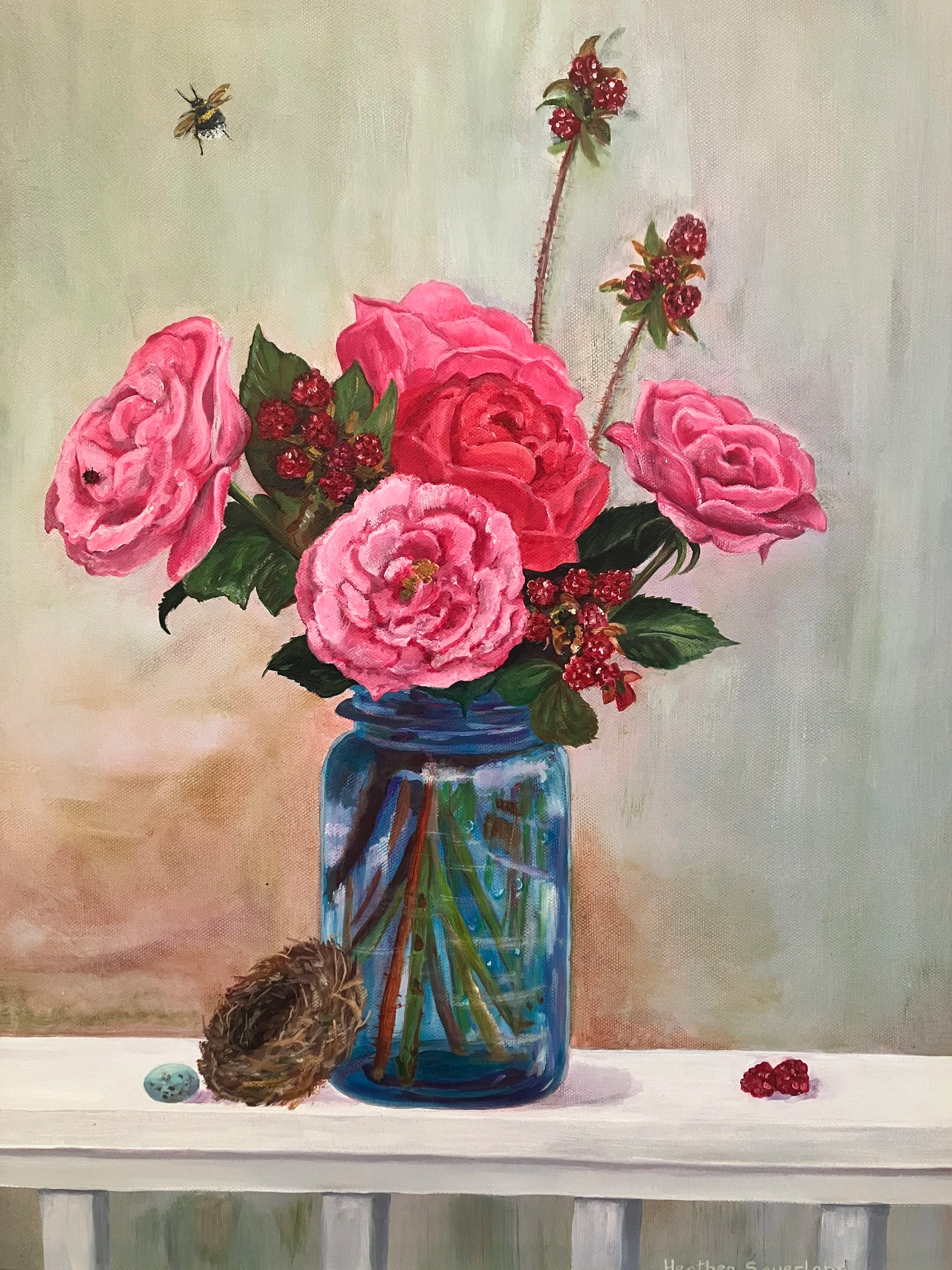 A still life painting of a bouquet of pink and red roses with green leaves in a blue glass vase, with a bee flying near the flowers, a brown bird nestat the base, a speckled eggshell, and a small cluster of red berries on a table against a plain background.