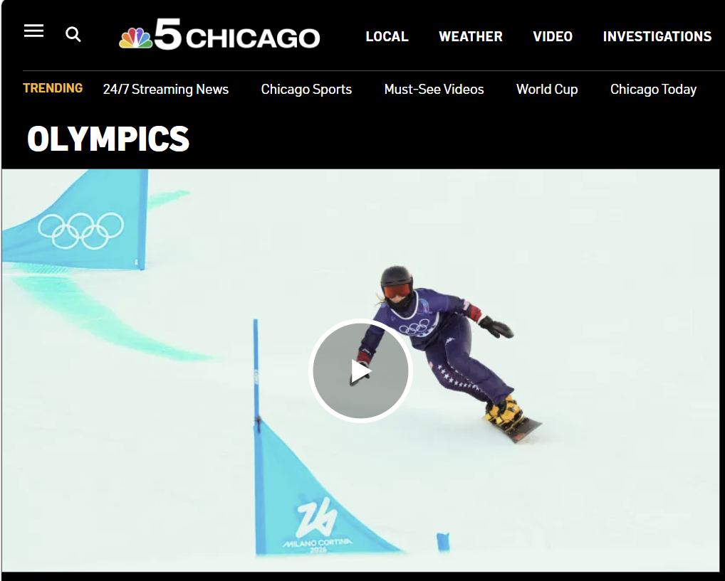 Iris carving through the Olympic snowboard course during the Winter Olympics.