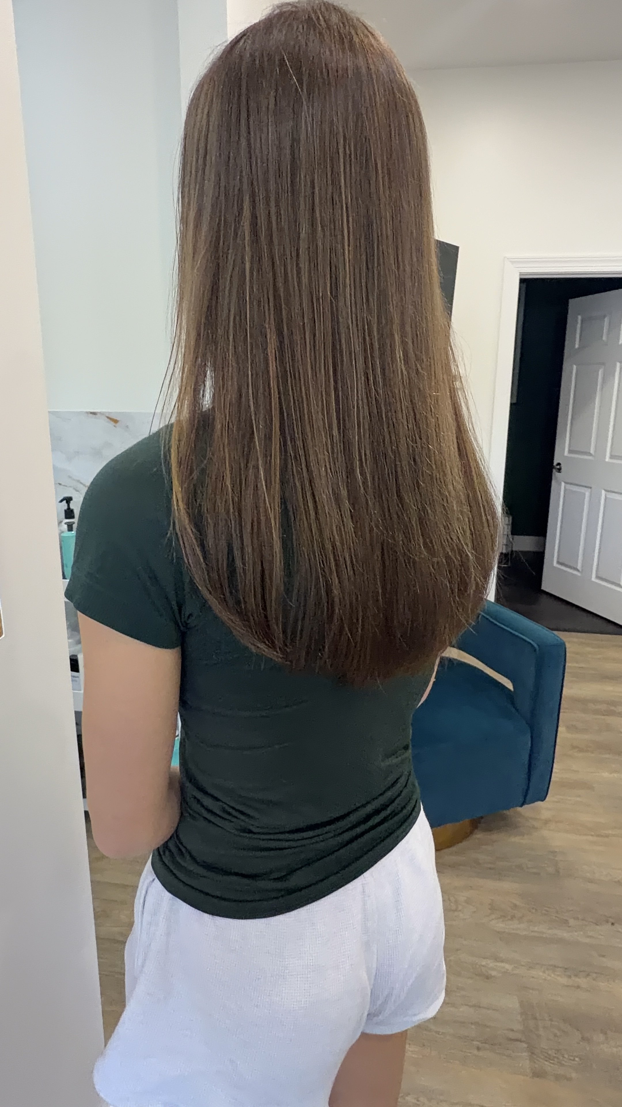 Young lady suffering from very fine hair. We installed just one row of so in extensions to thicken up her ponytail and her ends.