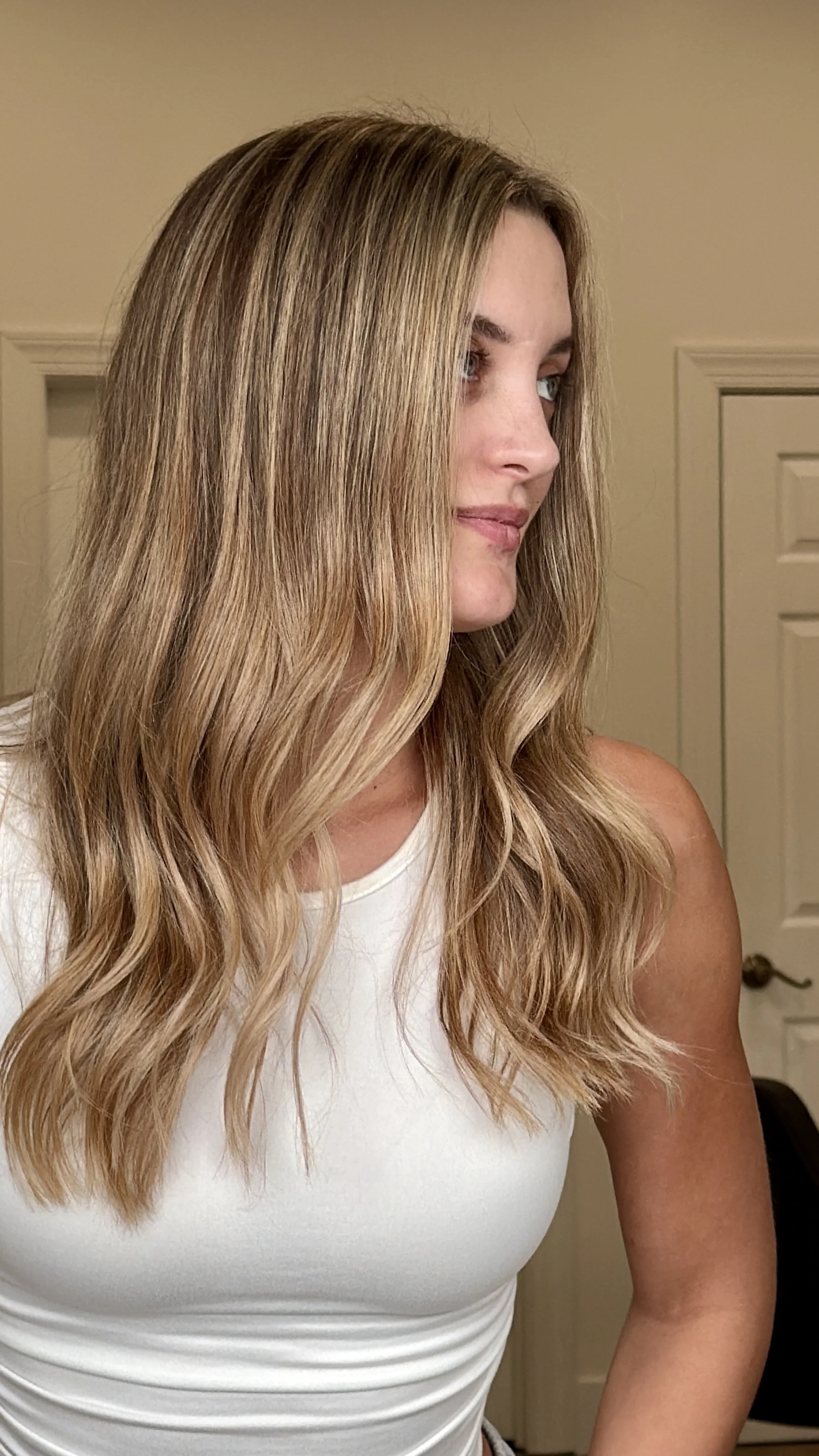 Added density, volume, length and blonde highlights all with keratin bonds. Application was intentionally to frame her face.