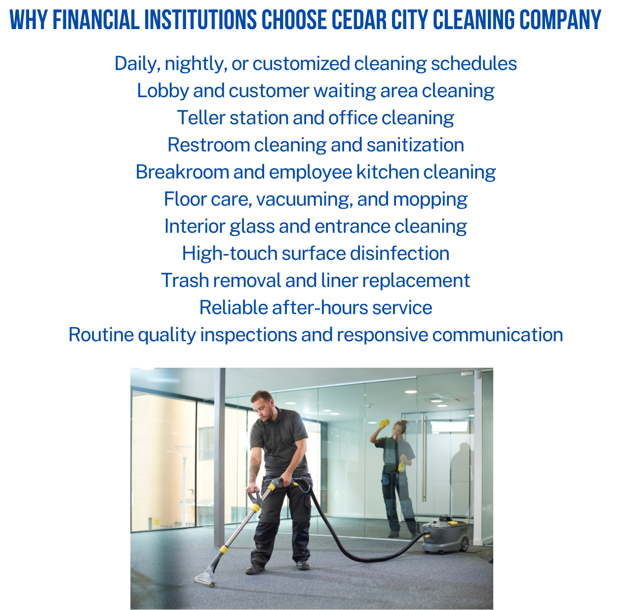 A man in black clothes vacuuming a grey carpet in an office interior, with a woman cleaning windows in the background.