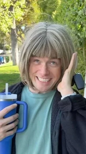 Local woman puts down emotional support water bottle as emergency contact