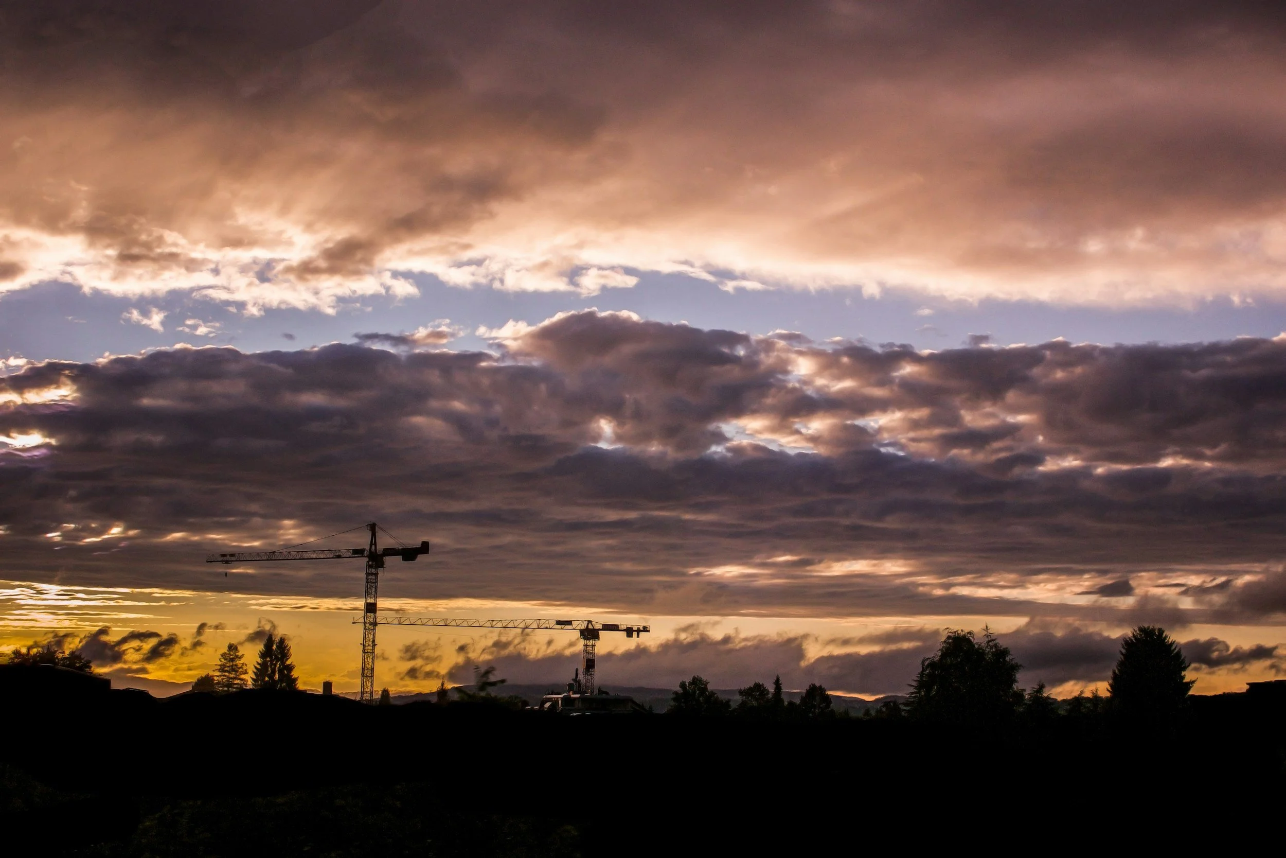 Sunset over a Houston-area construction site