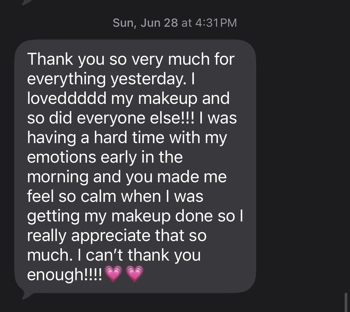 Screenshot of a text message expressing gratitude for help with makeup, mentioning feeling calm and appreciated, with pink heart emojis at the end.