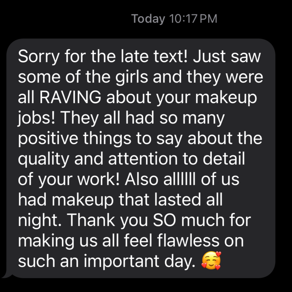A screenshot of a text message conversation on a phone, with a message expressing appreciation for makeup work, noting positive reviews from girls about makeup jobs, and thanking for making everyone feel flawless on an important day.