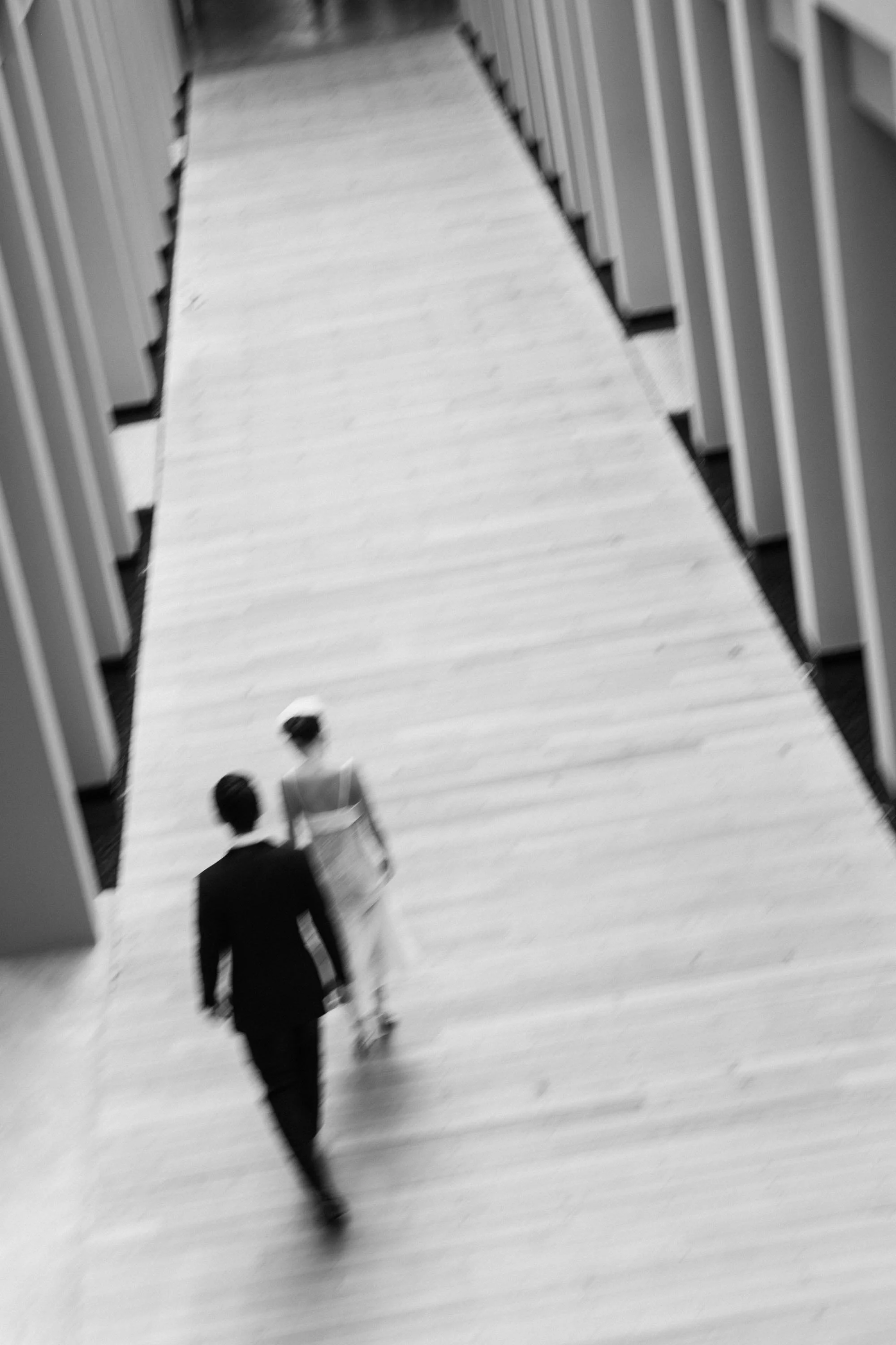 Bride and groom walking through COMO Point Yamu before the ceremony.