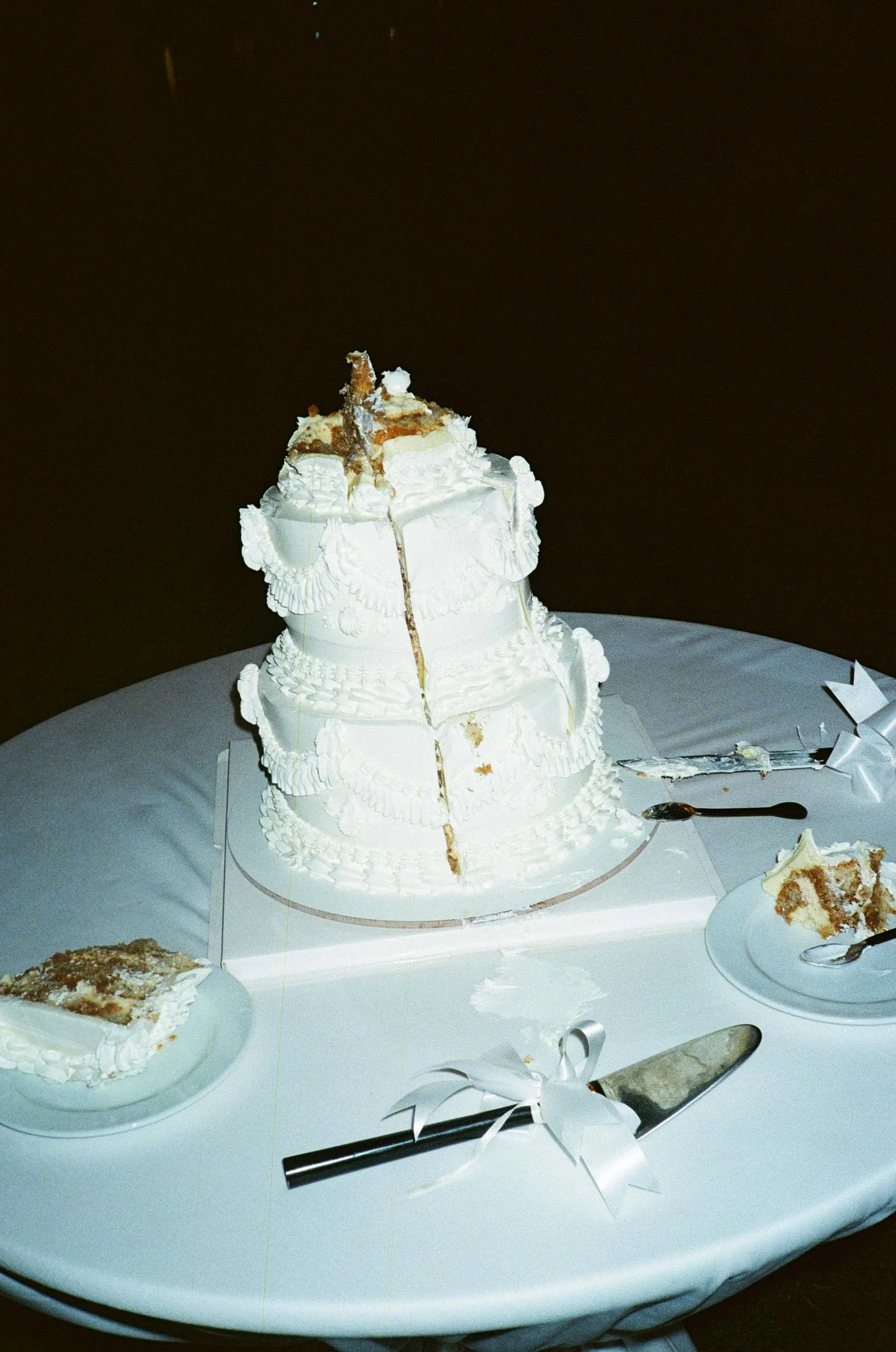 Wedding cake after the first slice.