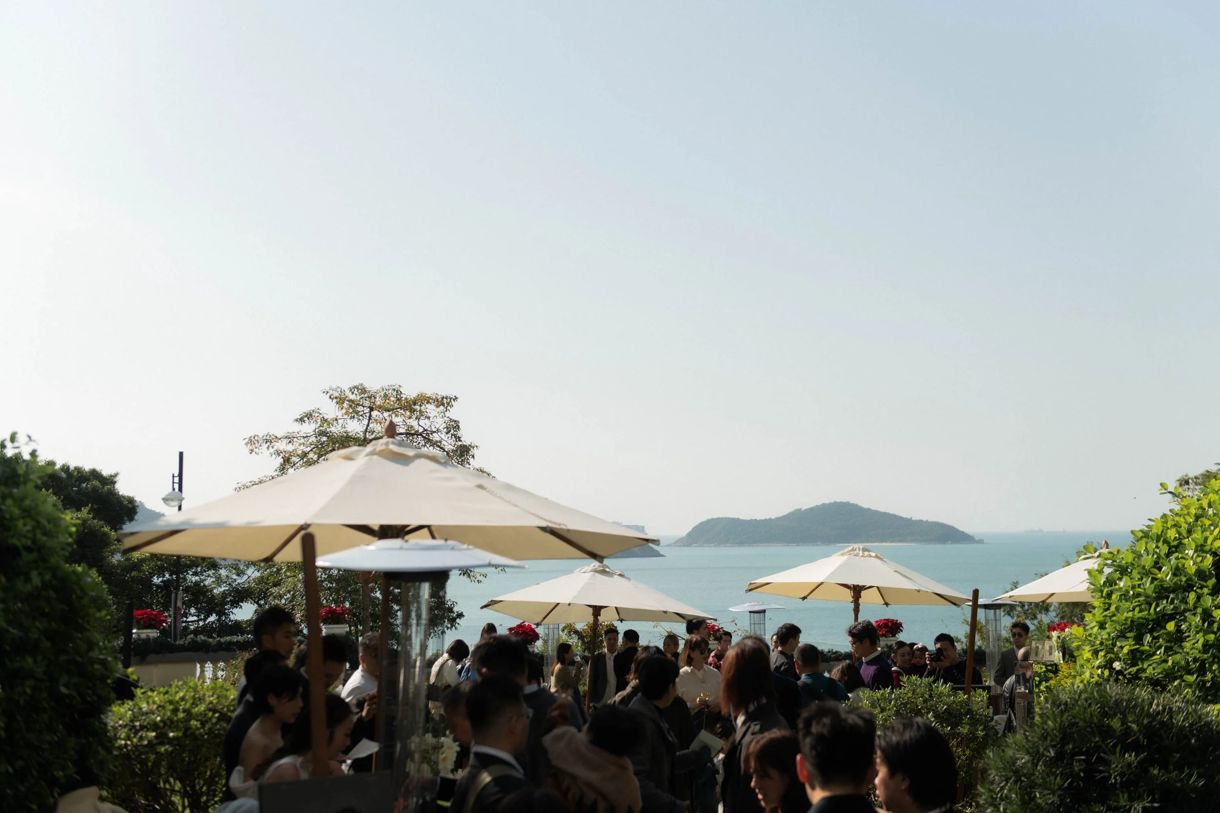 Outdoor wedding ceremony overlooking the sea at The Repulse Bay Hong Kong.