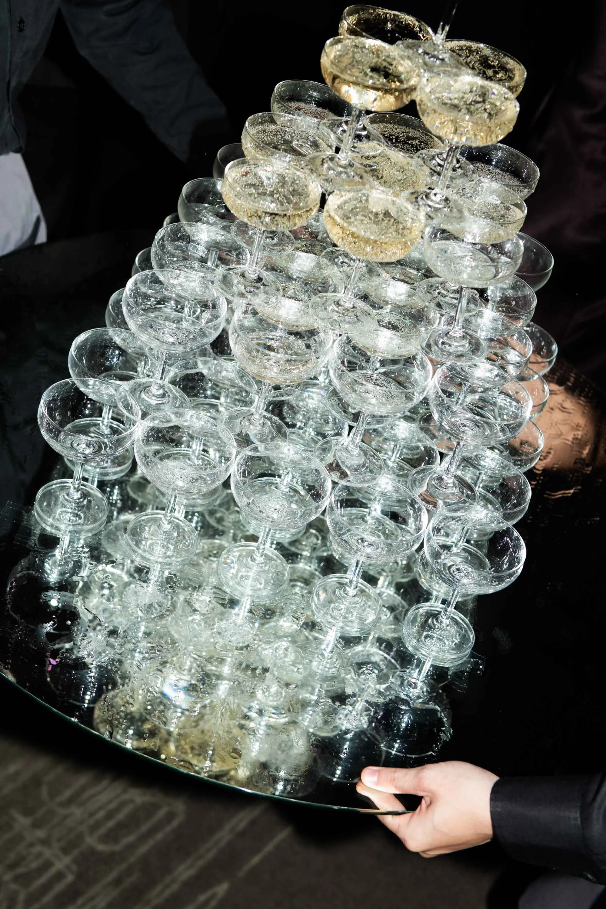 Champagne tower prepared for the evening celebration.