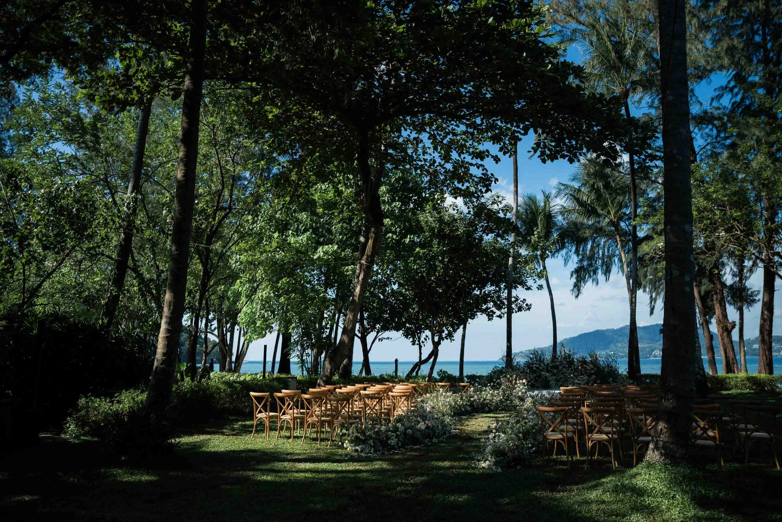Outdoor ceremony setup overlooking the ocean at Rosewood Phuket.