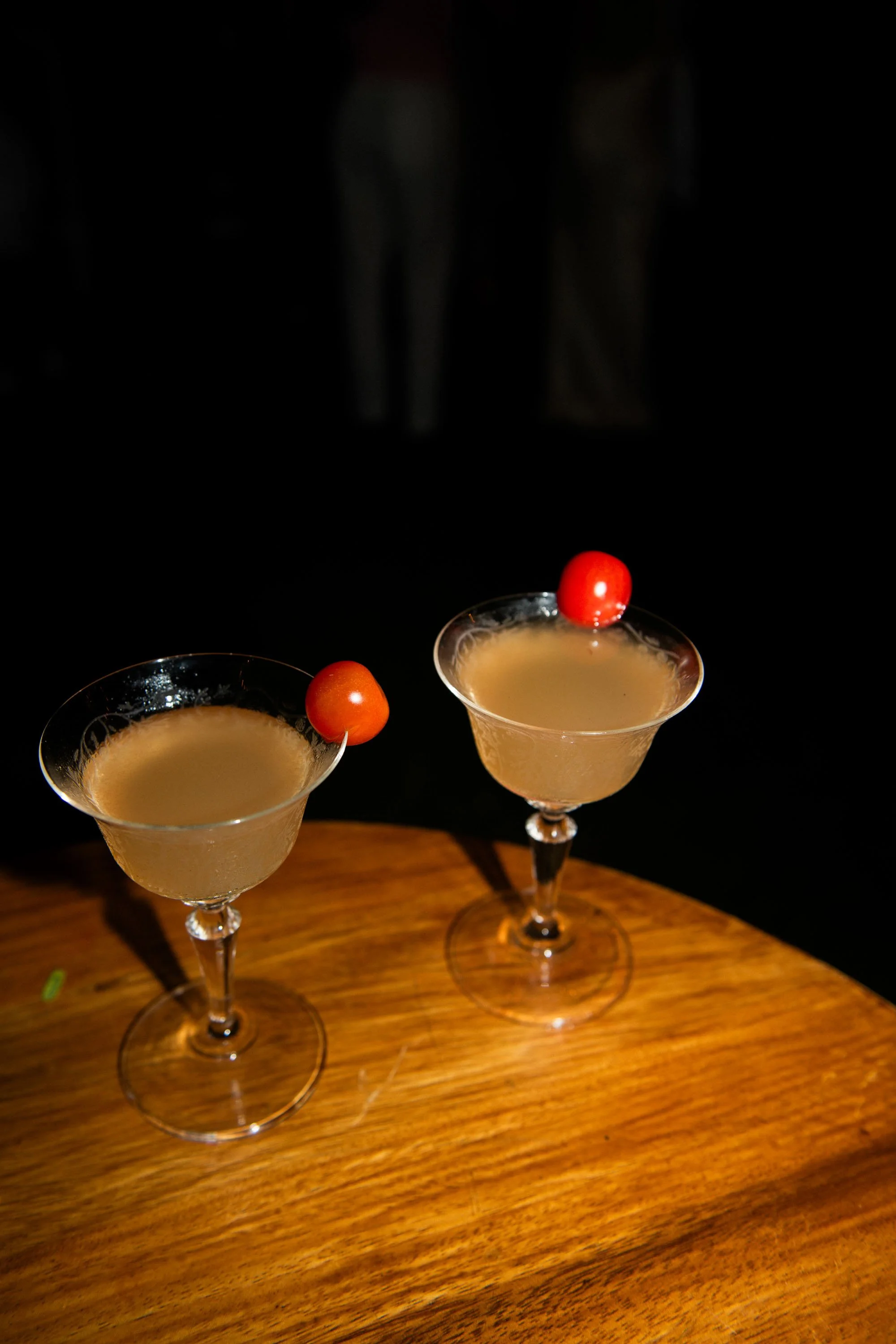 Signature cocktails prepared for guests during the wedding reception.