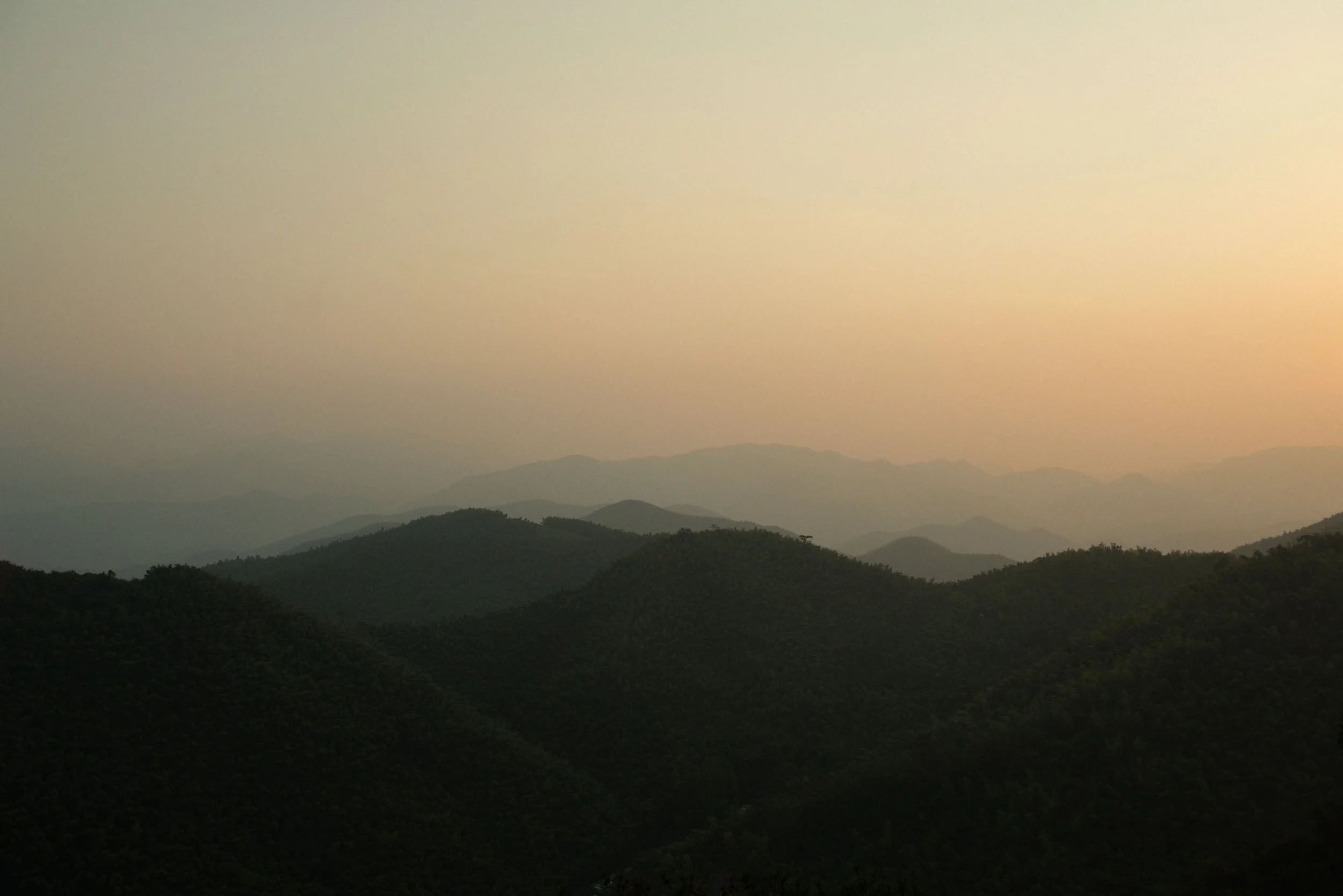 Mountain landscape at sunset overlooking Naked Castle Moganshan.