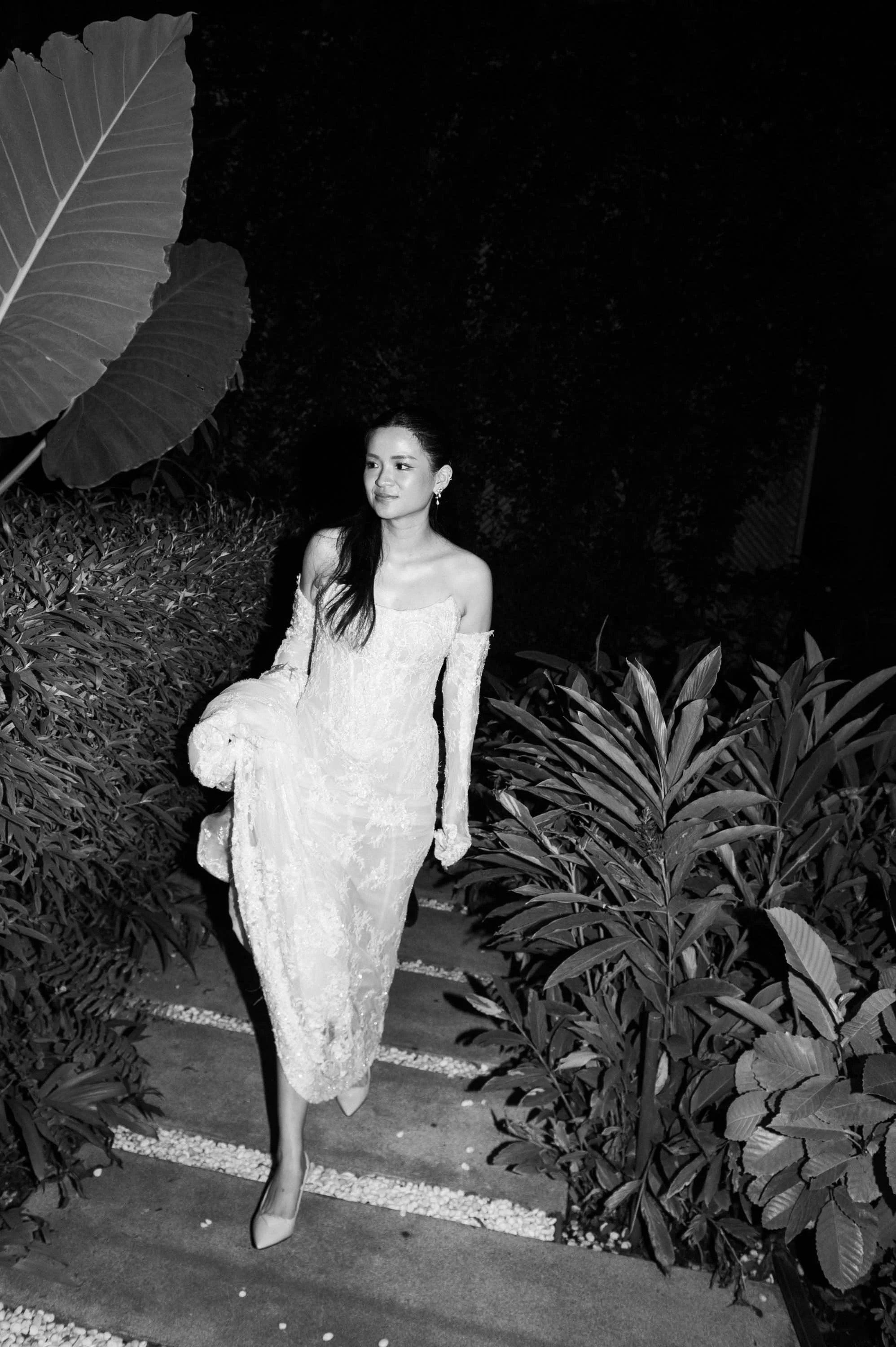 Bride walking toward the fireworks display.