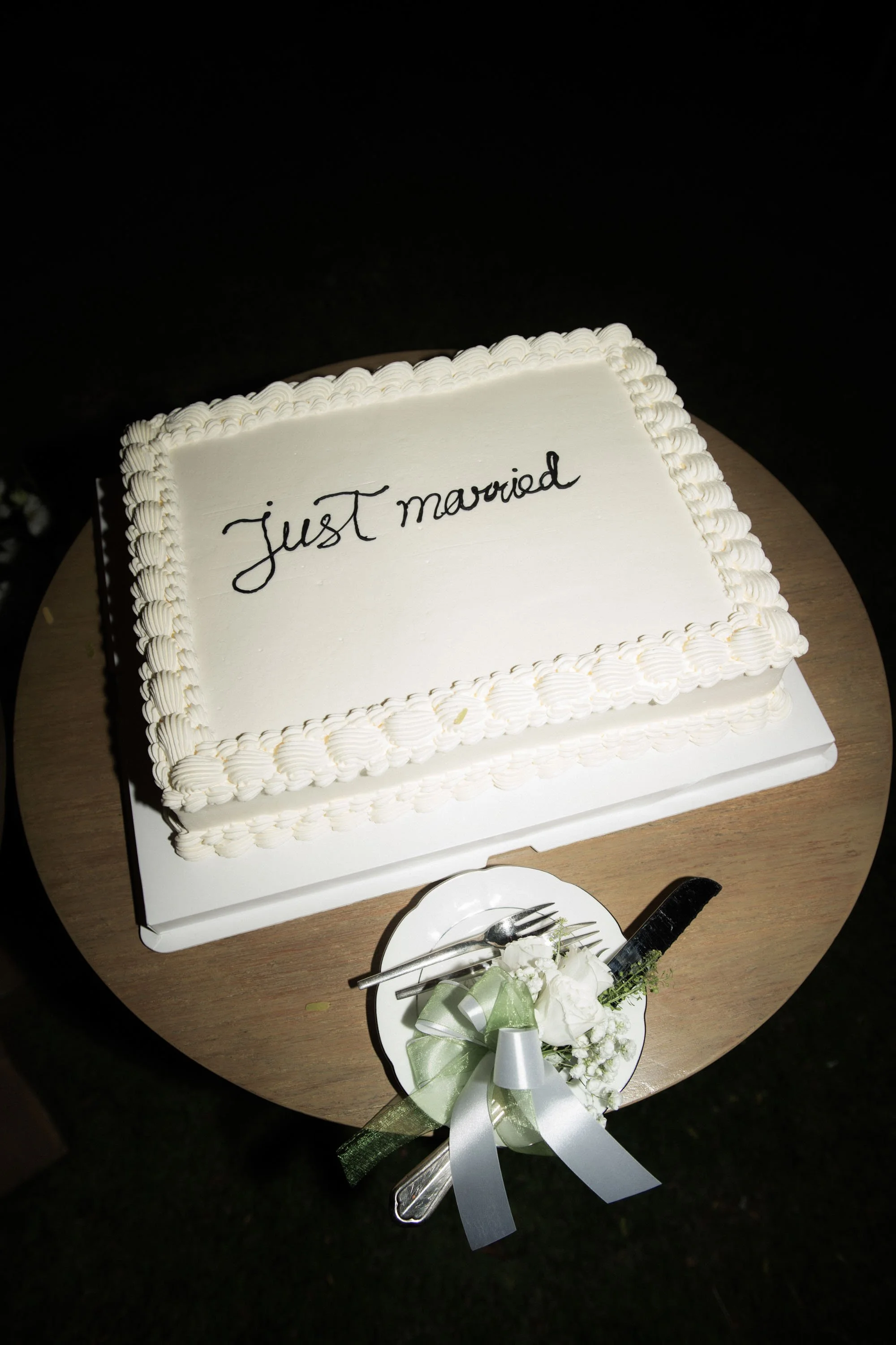 Wedding cake prepared for the evening celebration.