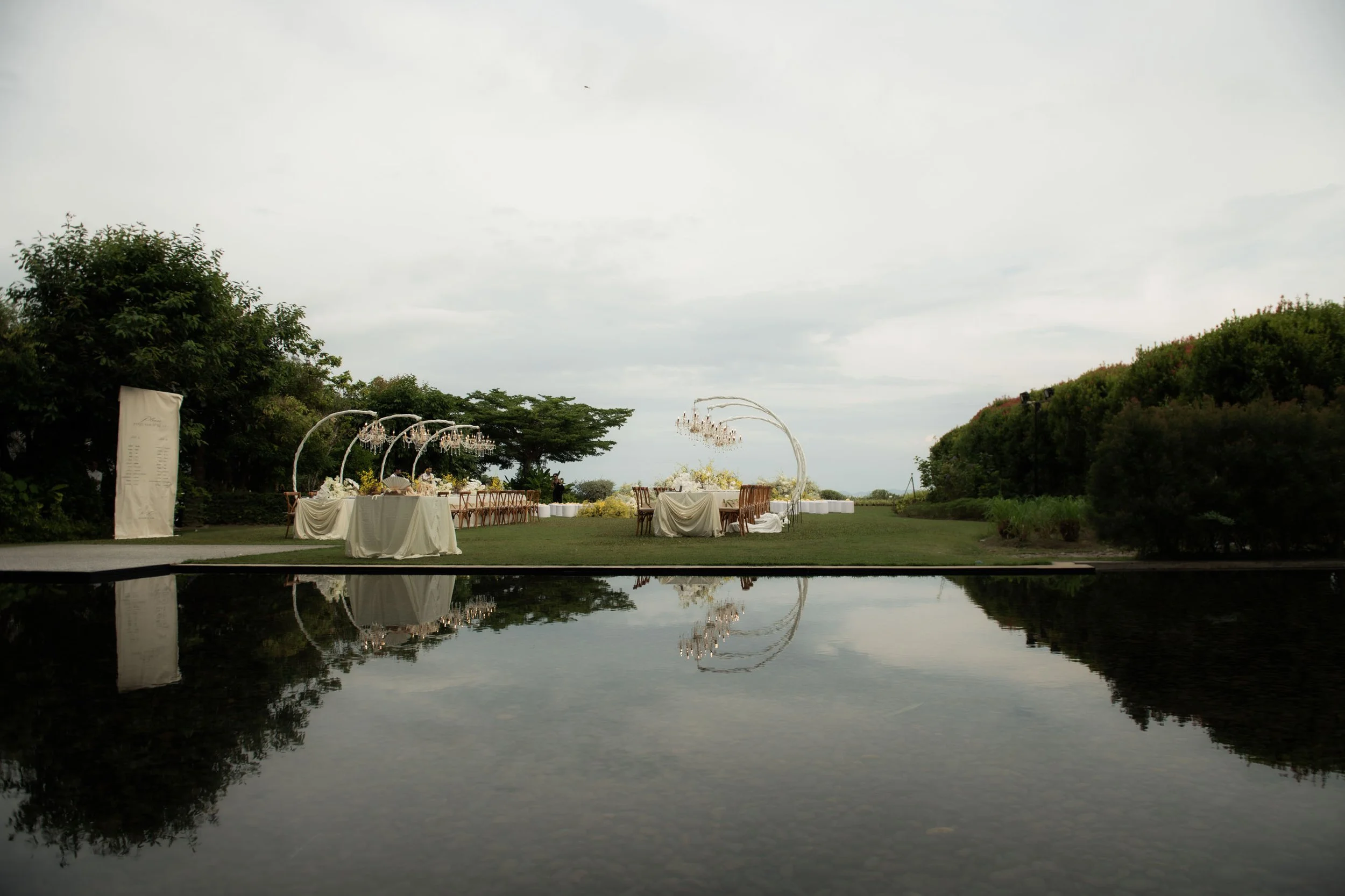 Outdoor dinner reception setup at COMO Point Yamu Phuket.
