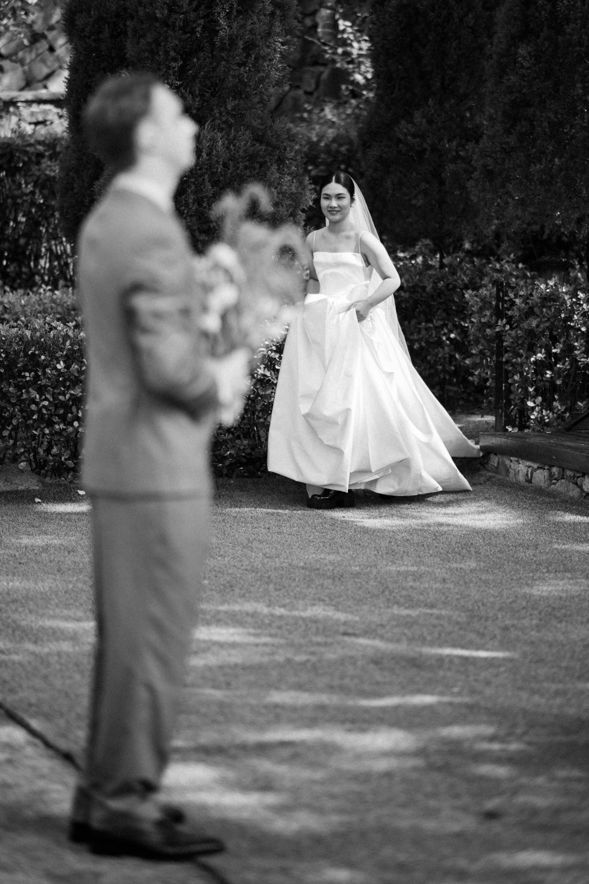 Bride walking toward the groom before the first look.