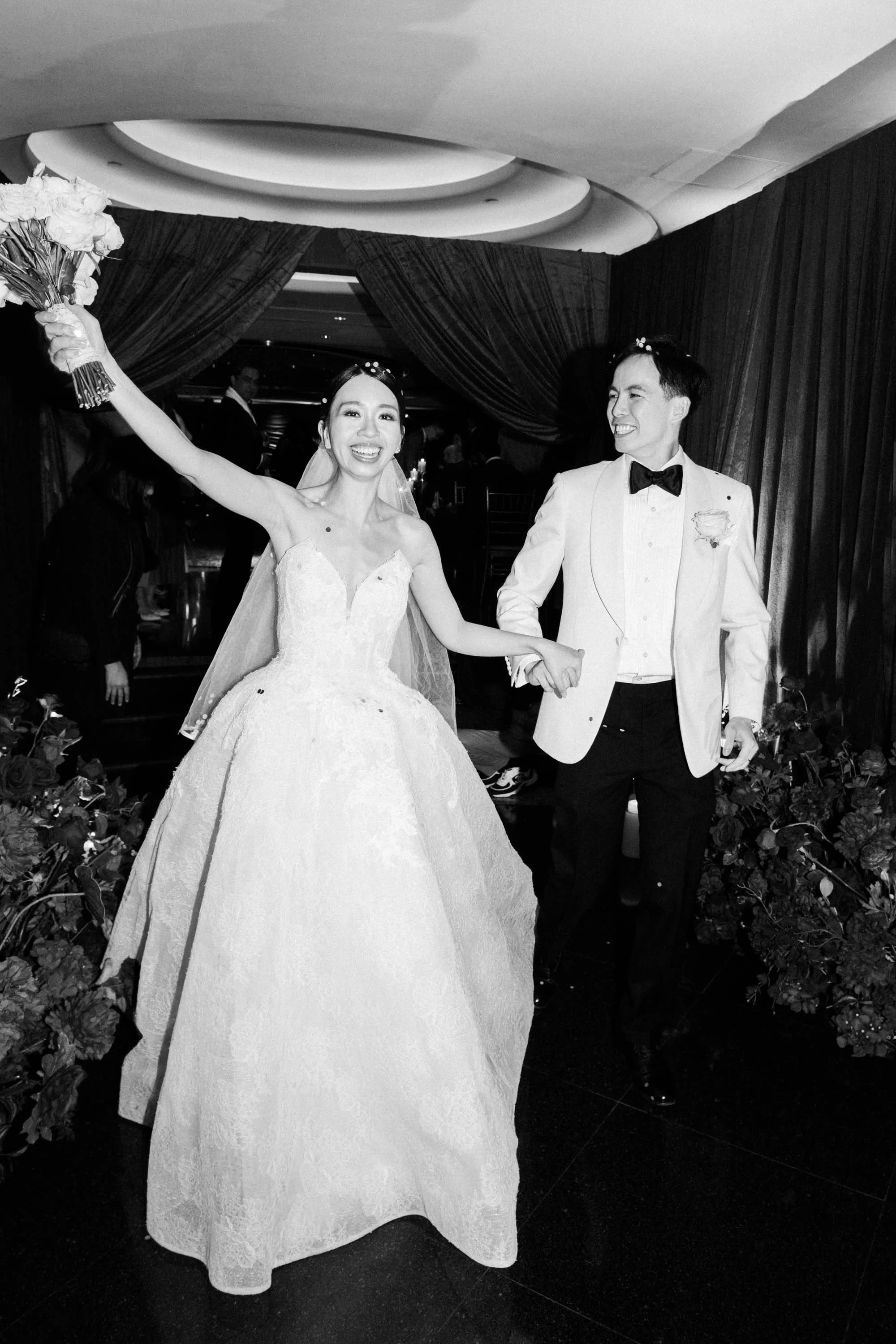 Bride and groom walking back down the aisle after the ceremony.