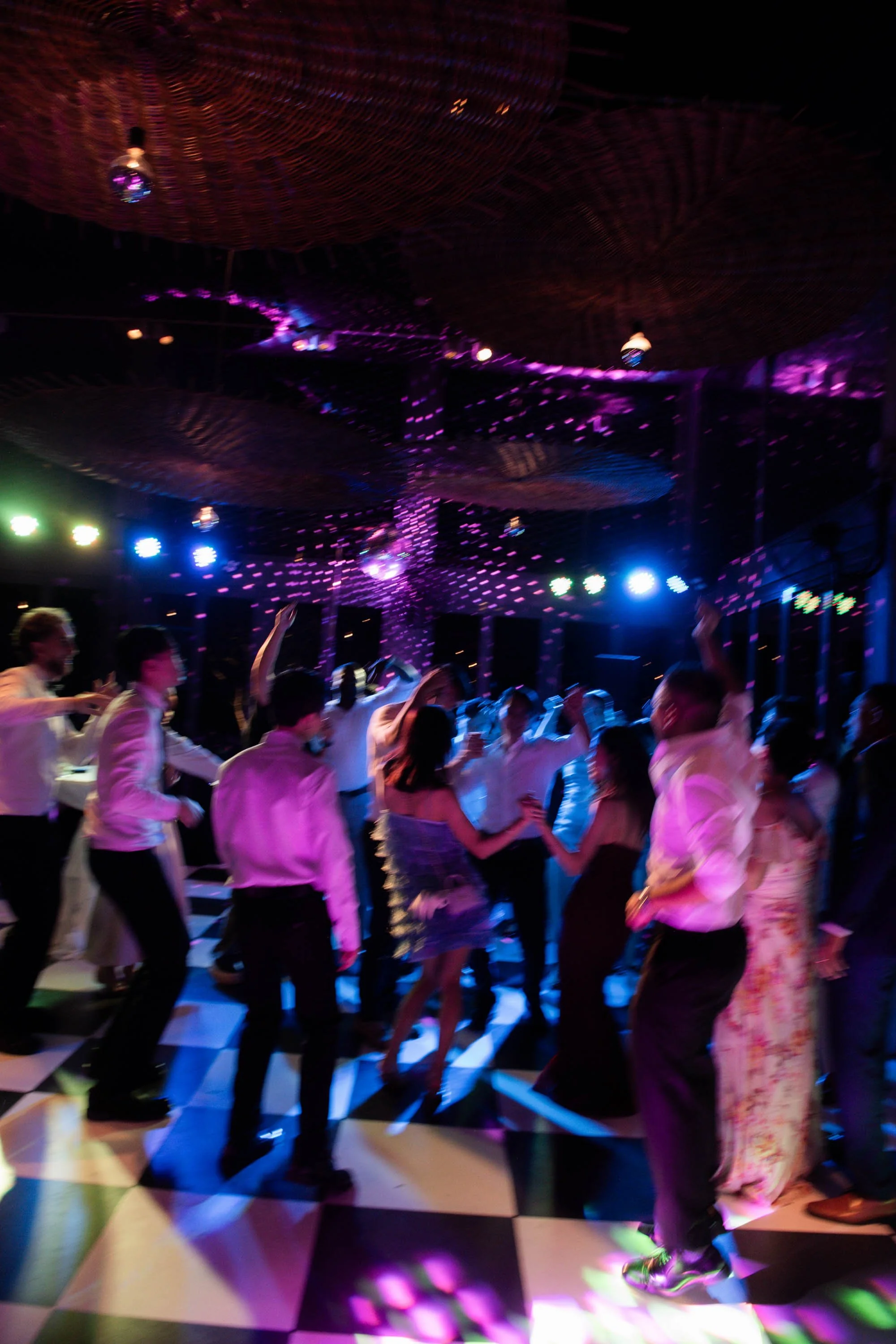 Guests dancing together during the after-party.