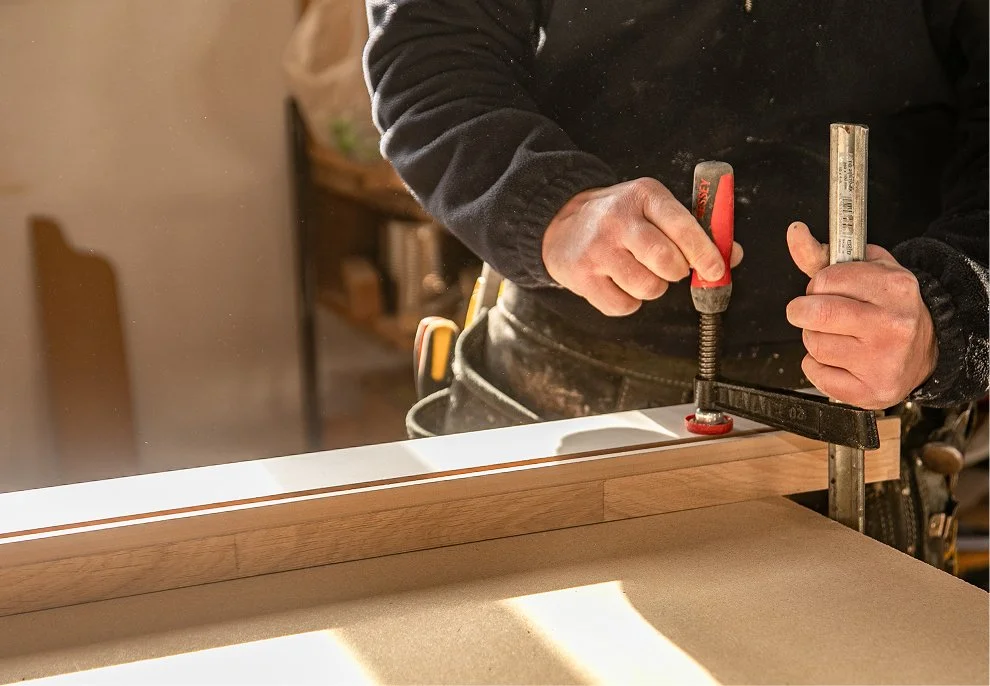 Carrolls craftsperson assembling timber joinery in the workshop.