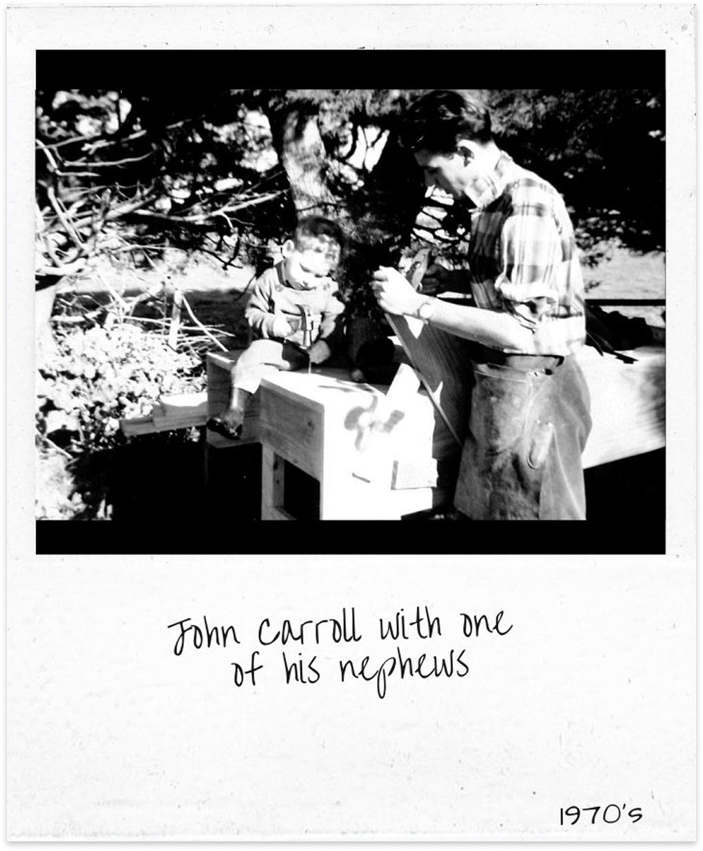 John Carroll working with timber alongside one of his nephews in the 1970s.