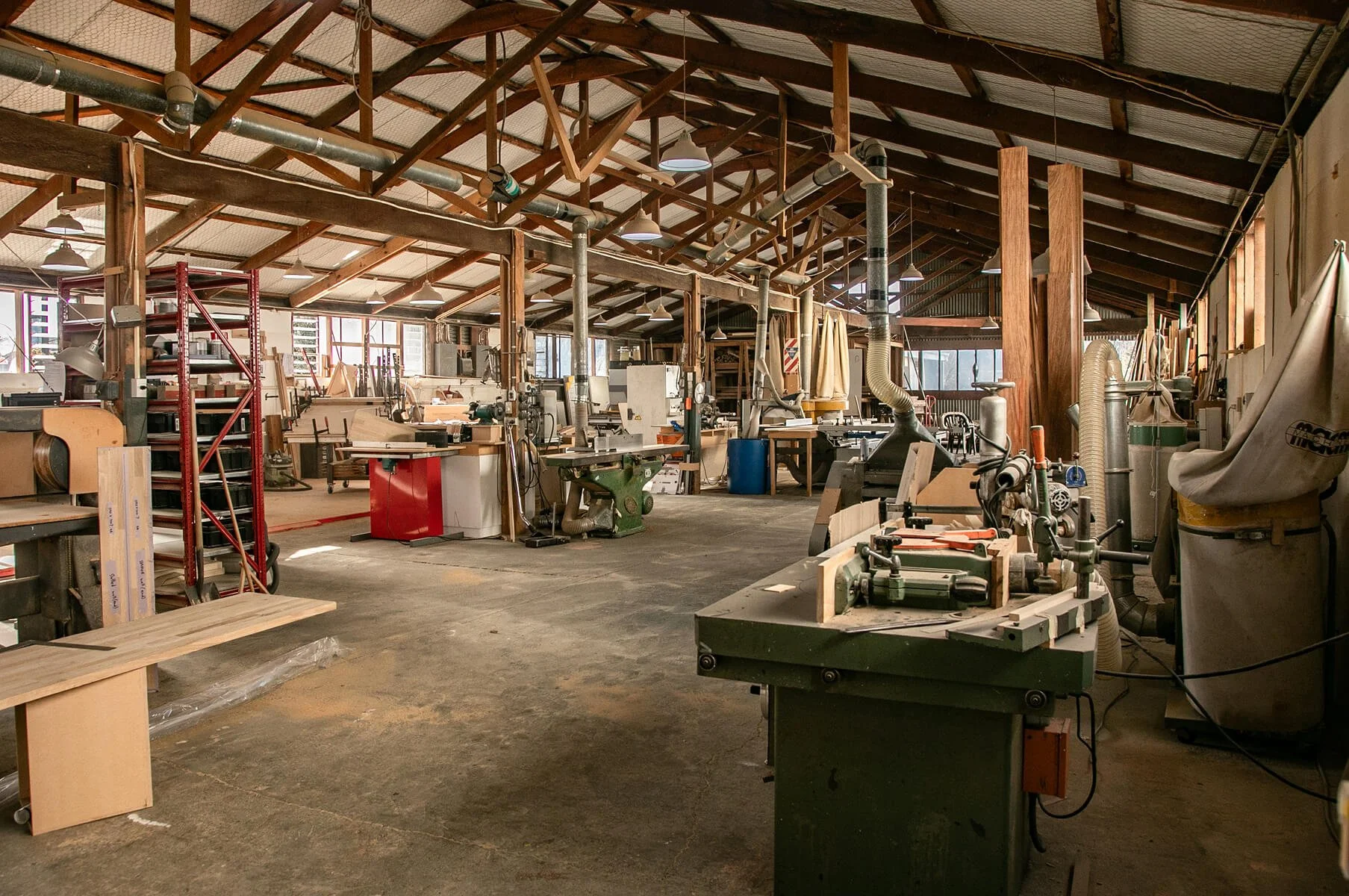 Traditional woodworking machinery in the Carrolls timber workshop.