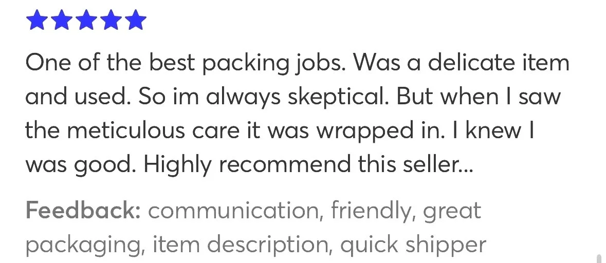 Customer review with five blue stars, praising a seller for careful packaging and recommending for a delicate item.