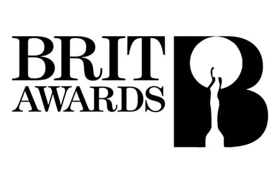 Brit Awards logo featuring the text 'BRIT AWARDS' and a stylized black and white figure reaching for a circular shape.