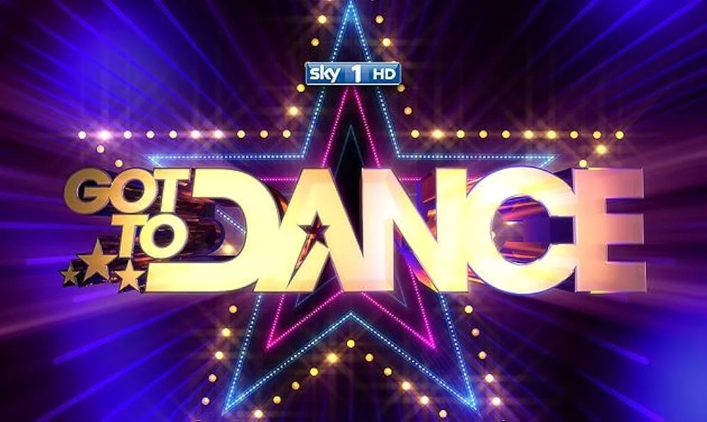 Colorful neon sign for TV show 'Got to Dance' with a glowing pink and blue star in the background.