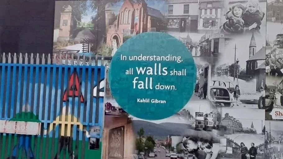 'In understanding, all walls shall fall down,' by Kahlil Gibran. Belfast peace walls.