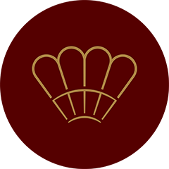 Gold chef's hat outline on a dark red background.