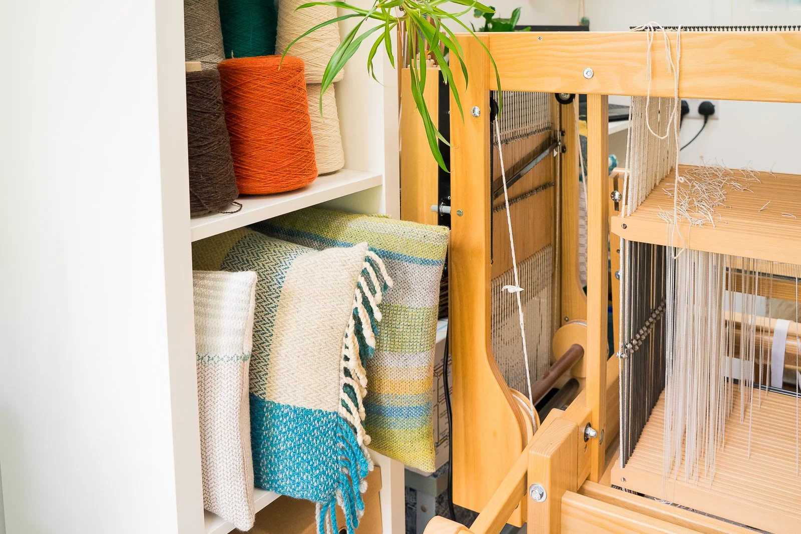 Treadle Lightly handwoven cushions in studio