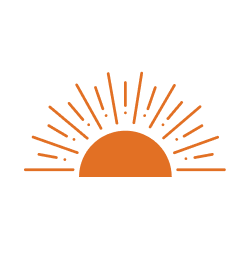 Lever de soleil avec rayons lumineux orange au-dessus de l'horizon