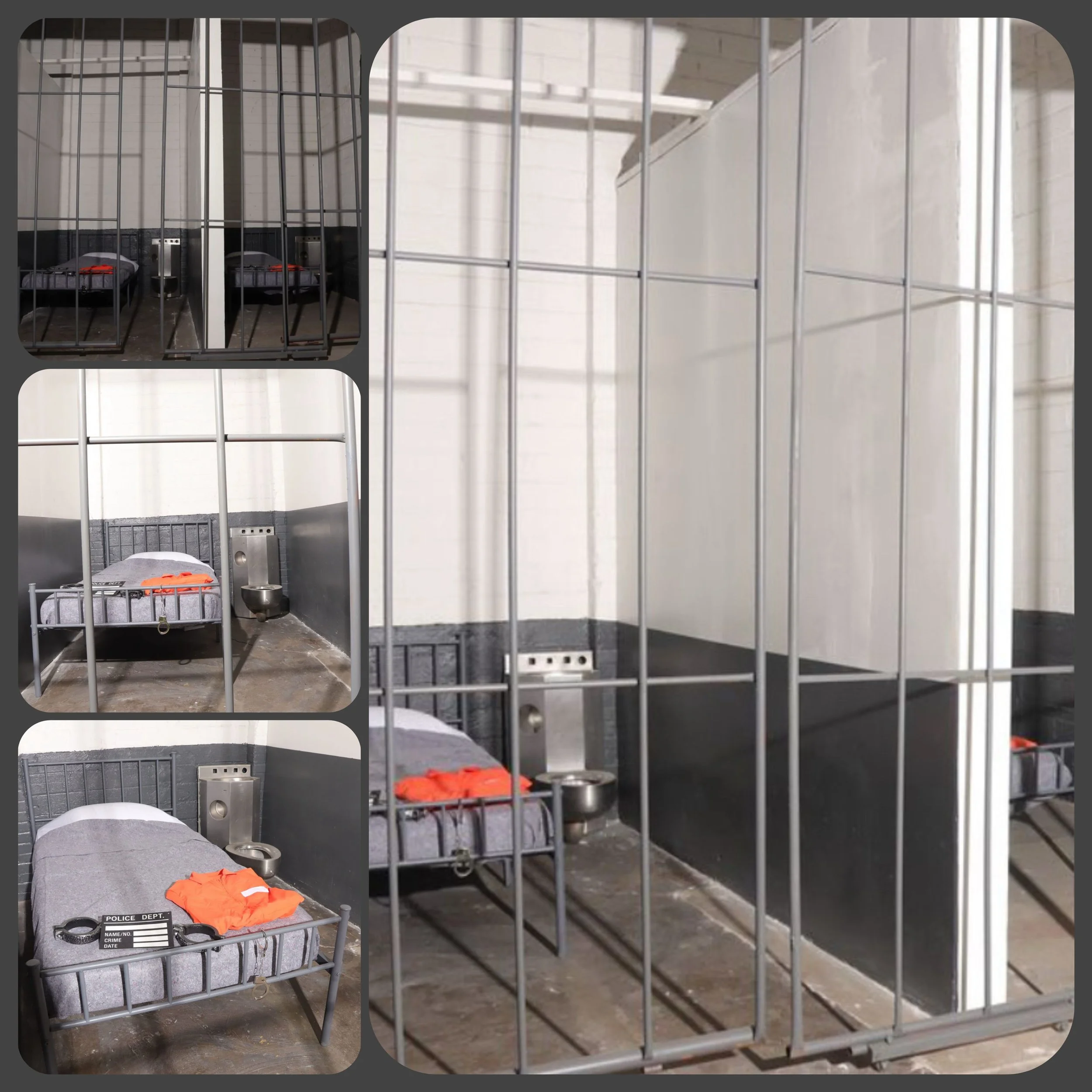 A jail cell with a metal bed, orange clothing, a police tag, and a metal food bowl, with empty neighboring cells.