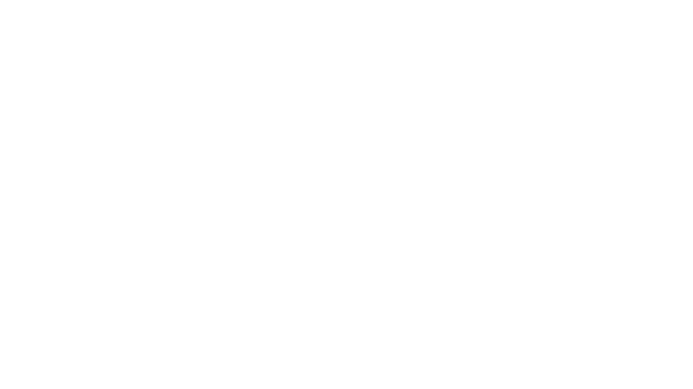 Outline of Edinburgh Castle with the city skyline behind it.